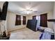 Bedroom with natural light, a ceiling fan, and carpet flooring at 1350 S Greenfield Rd # 1130, Mesa, AZ 85206