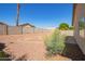 View of gravel backyard featuring block fence at 15440 W Mauna Loa Ln, Surprise, AZ 85379