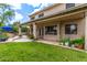 Inviting backyard patio with ample space for outdoor dining and relaxation at 1571 E Saratoga Ct, Gilbert, AZ 85296