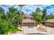 Stunning two-story home featuring a spacious three-car garage and beautifully landscaped front yard at 1571 E Saratoga Ct, Gilbert, AZ 85296