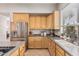 Charming kitchen equipped with stainless steel appliances, ample cabinets, and functional design at 1571 E Saratoga Ct, Gilbert, AZ 85296