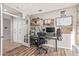 Well-lit home office featuring two desks, storage, and shelving at 1571 E Saratoga Ct, Gilbert, AZ 85296