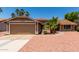 Charming single-story home with a two-car garage and desert landscaping at 1630 W Calle Del Norte --, Chandler, AZ 85224