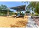 Community playground features slides, climbing structures, and shaded seating at 1630 W Calle Del Norte --, Chandler, AZ 85224