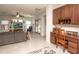 Spacious living area with an open floor plan, a built-in desk, and access to the backyard patio at 18198 E El Viejo Desierto --, Gold Canyon, AZ 85118