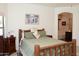 Spacious bedroom with a unique bed frame, ample natural light, and access to the ensuite bathroom at 18198 E El Viejo Desierto --, Gold Canyon, AZ 85118
