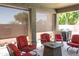 Covered patio features comfortable seating and privacy shades at 18198 E El Viejo Desierto --, Gold Canyon, AZ 85118
