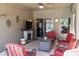 Outdoor living featuring covered patio, fireplace, seating, and view of the pool at 18198 E El Viejo Desierto --, Gold Canyon, AZ 85118