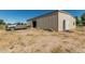Exterior of a large outbuilding, perfect for a workshop or storage with vehicle parking at 19302 W Melvin St, Buckeye, AZ 85326