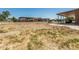 Expansive property grounds with outbuildings, fencing, and lots of space for various uses at 19302 W Melvin St, Buckeye, AZ 85326