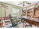 Functional workshop space with workbench, tools, and natural light from a window at 19302 W Melvin St, Buckeye, AZ 85326