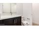 Contemporary bathroom with a modern vanity, stone countertop and a brushed nickel faucet at 19338 S 212Th Pl, Queen Creek, AZ 85142