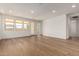 Bright living space with large windows and hardwood floors at 19338 S 212Th Pl, Queen Creek, AZ 85142
