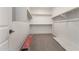 Walk-in closet with carpeted floors and shelves at 19338 S 212Th Pl, Queen Creek, AZ 85142