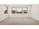 Comfortable bedroom with neutral carpet, ample natural light from several wide windows at 19354 S 212Th Pl, Queen Creek, AZ 85142