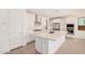 Bright kitchen featuring a large island, stainless steel appliances, and sleek cabinetry at 19354 S 212Th Pl, Queen Creek, AZ 85142
