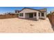 Spacious backyard with a covered patio, offering a great opportunity for outdoor living and entertaining at 19434 S 212Th Pl, Queen Creek, AZ 85142