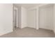 Neutral bedroom with carpeted floor, a closet and a bright and modern space at 19434 S 212Th Pl, Queen Creek, AZ 85142