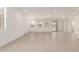 Spacious living room with large windows, tile flooring, and plenty of natural light at 19434 S 212Th Pl, Queen Creek, AZ 85142