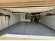 Well-organized garage with ample storage cabinets and epoxy flooring, offering a clean and functional space at 19882 N Crimson Ridge Way, Surprise, AZ 85374
