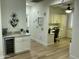 Hallway with a bar area and office space, perfect for entertaining and working at 19882 N Crimson Ridge Way, Surprise, AZ 85374