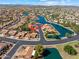 Overhead view of waterfront community with lakes and single-Gathering homes featuring tile roofs at 20352 N 109Th Dr, Peoria, AZ 85373