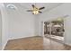 Bright bedroom with sliding glass doors, ceiling fan, and tile floors at 20352 N 109Th Dr, Peoria, AZ 85373