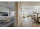 Bright open space with combination living room and bedroom featuring neutral colors and balcony access at 205 N 74Th St # 261, Mesa, AZ 85207