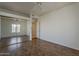 Bedroom featuring hardwood floors, ceiling fan, and large closet at 205 N 74Th St # 261, Mesa, AZ 85207