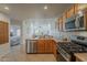 Modern kitchen with stainless steel appliances, ample counter space, and an open design at 205 N 74Th St # 261, Mesa, AZ 85207