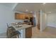 Well-equipped kitchen with a breakfast bar and modern appliances, perfect for casual dining at 205 N 74Th St # 261, Mesa, AZ 85207