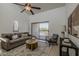 Cozy living room with a private balcony, creating a relaxing retreat with natural light at 205 N 74Th St # 261, Mesa, AZ 85207