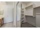 Walk-in closet with mirror doors and shelving at 205 N 74Th St # 261, Mesa, AZ 85207