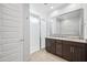 Modern bathroom featuring double vanity with granite countertop and glass enclosed shower at 21075 E Estrella Rd, Queen Creek, AZ 85142