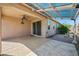 Covered patio with fan and plenty of room for outdoor enjoyment at 21075 E Estrella Rd, Queen Creek, AZ 85142