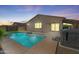 Beautiful pool and patio area featuring a hot tub, covered patio, and easy access to the home at 21075 E Estrella Rd, Queen Creek, AZ 85142