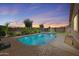 Inviting backyard pool with a private fence line, perfect for relaxing and entertaining outdoors at 21075 E Estrella Rd, Queen Creek, AZ 85142