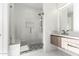 Stylish bathroom showcases a glass-enclosed shower with decorative tile and modern fixtures at 2130 E Turney Ave # 4, Phoenix, AZ 85016