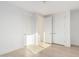 Bright bedroom with hardwood floors, white walls, and closet space at 2130 E Turney Ave # 4, Phoenix, AZ 85016