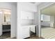 Well-lit wet bar with sleek cabinetry and access to the outdoor deck at 2130 E Turney Ave # 4, Phoenix, AZ 85016