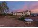 Charming home featuring a lush yard, perfect for outdoor living and enjoying serene sunsets at 22216 W Bajada Dr, Wittmann, AZ 85361