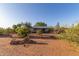 Charming single story home with well-kept landscaping, set in a peaceful desert location at 22216 W Bajada Dr, Wittmann, AZ 85361