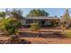 Charming single story home with well-kept landscaping, set in a peaceful desert location at 22216 W Bajada Dr, Wittmann, AZ 85361