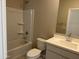 Bathroom featuring a shower/tub, light fixtures, and white vanity with sink at 23214 W Miami St, Buckeye, AZ 85326