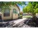 Charming backyard showcasing well-maintained landscaping and mature trees at 2370 W Maplewood St, Chandler, AZ 85286