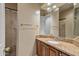 Bathroom with a shower and vanity featuring granite countertops and a single sink at 2370 W Maplewood St, Chandler, AZ 85286