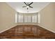 Bright bedroom with hardwood floors and large windows with shutters at 2370 W Maplewood St, Chandler, AZ 85286