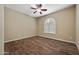 This is a bedroom featuring wood flooring and a window with white shutters at 2370 W Maplewood St, Chandler, AZ 85286