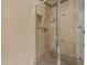 Enclosed shower with a glass door, tile surround and built in niche at 2370 W Maplewood St, Chandler, AZ 85286