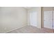 Cozy bedroom with closet and a door leading to other parts of the house at 23853 W Hammond Ln, Buckeye, AZ 85326